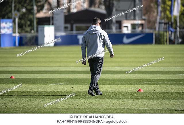 15 April 2019, Berlin: Pal Dardai, coach of the Bundesliga soccer team Hertha BSC, crosses the pitch during the training of the reservists