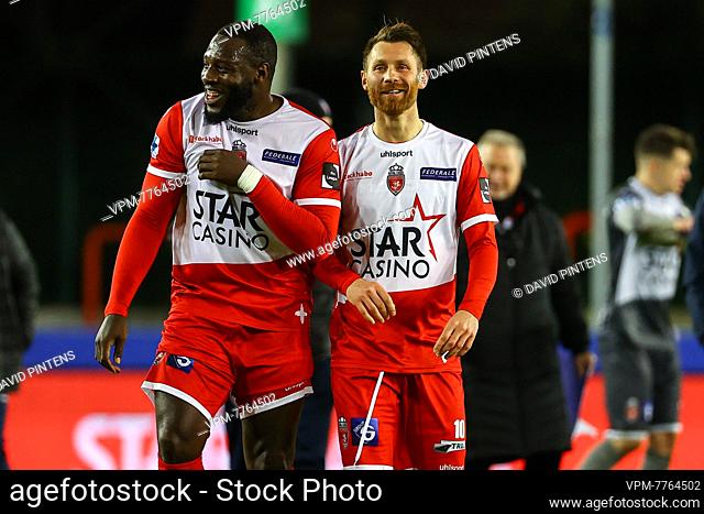 Mouscron's Harlem Gnohere and Mouscron's Teddy Chevalier celebrates after winning a soccer match between Royal Excel Mouscron and Waasland-Beveren