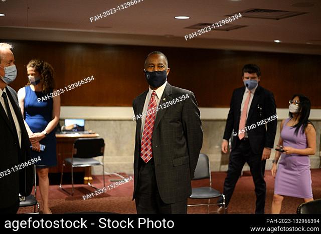 United States Secretary of Housing and Urban Development (HUD) Ben Carson, center, arrives on Capitol Hill in Washington, D.C