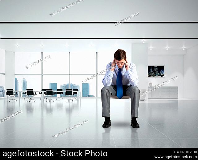 young businessman focused on his thoughts, concentrating on the task