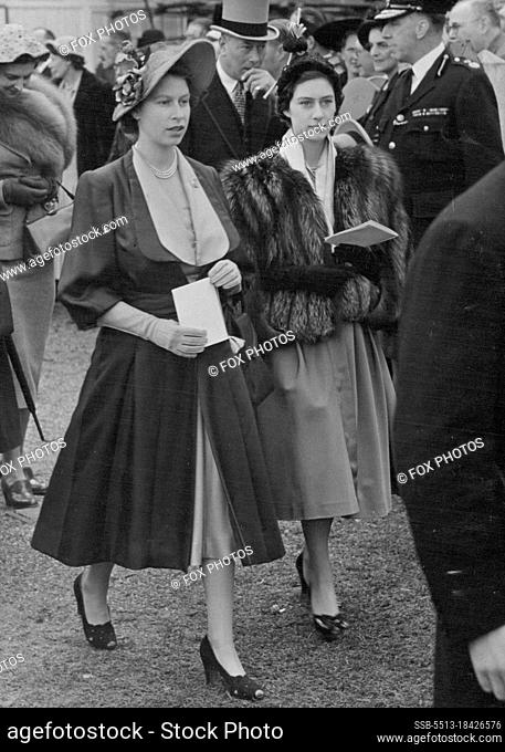 Princesses at the Derby. The Princesses Margaret and Elizabeth pictured as they walk through the Paddock at today's Derby meeting at Epsom