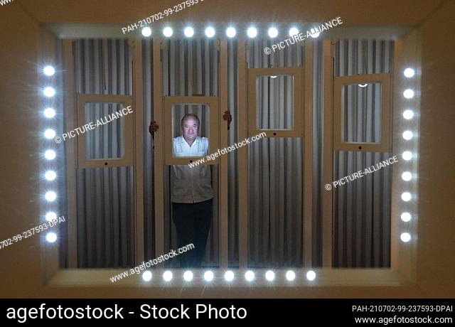 02 July 2021, Hamburg: Andreas Heinecke, founder and managing director of Dialoghaus Hamburg, stands in the ""Gallery of Faces"" in the exhibition ""Dialogue in...
