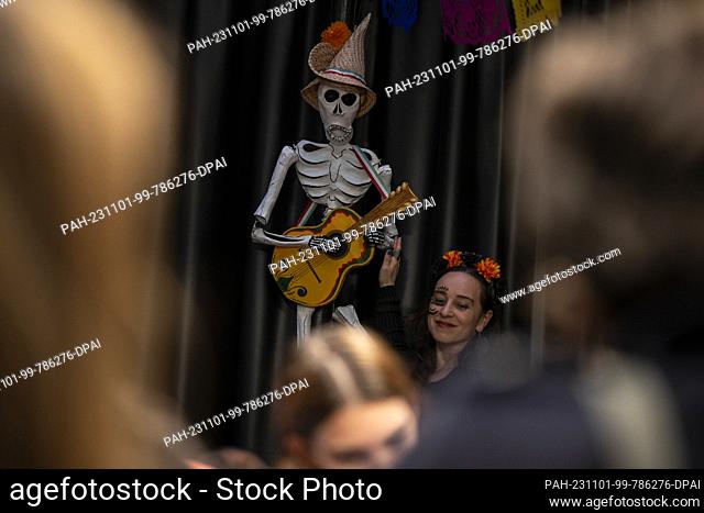 01 November 2023, Berlin: A skeleton figure stands in the Humboldt Forum. During the festival, the dead return from the afterlife to the realm of the living for...