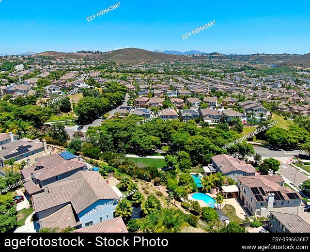 Aerial view of rich neighborhood with big villas with pool in San Diego, California, USA. Aerial view of residential modern subdivision luxury mansions