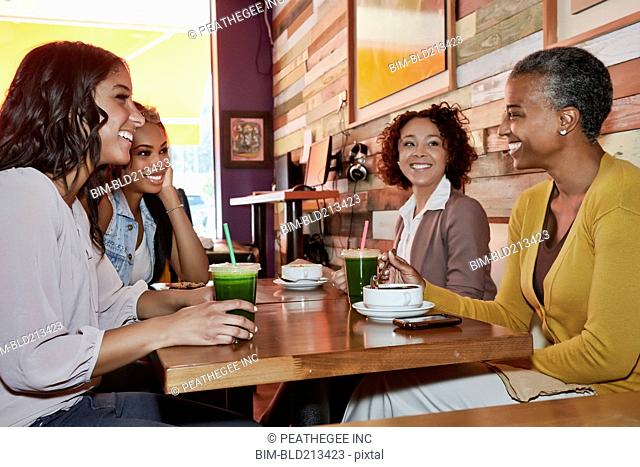 Women talking in cafe