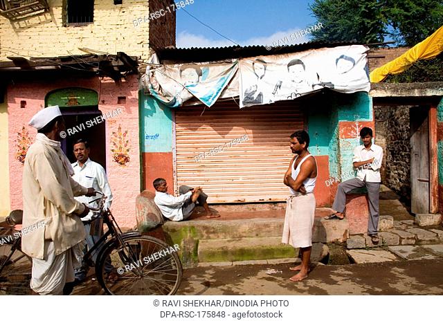 Villagers discussing on street ; Nandur ; Marathwada ; Maharashtra ; India NOMR