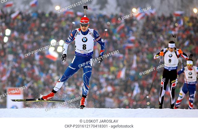 From left: Ondrej Moravec of Czech Republic, Julian Eberhard of Austria and Erlend Bjontegaard of Norway compete in the World Biathlon Cup men's pursuit race in...
