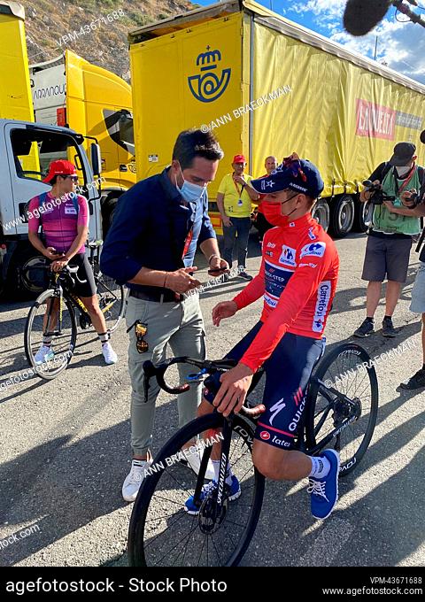 Belgian Remco Evenepoel of Quick-Step Alpha Vinyl and Eolo-Kometa general manager Alberto Contador pictured after stage 20 of the 2022 edition of the 'Vuelta a...