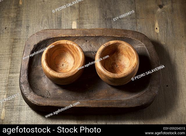 Wooden bowls on a wood table