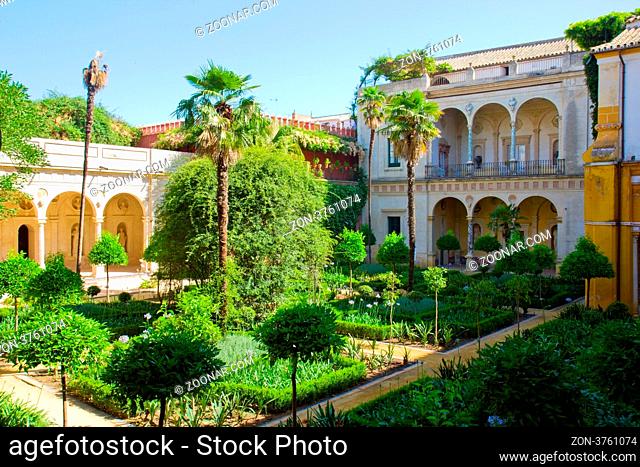 Courtyard with garden of Casa de Pilatos, Seville, Andalusia, Spain