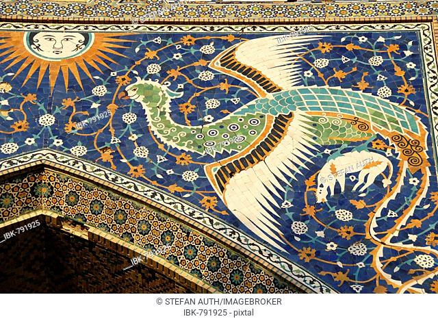Artistic detail, majolica ceramics, peacock flying toward the sun, entrance to the Nadir Divan Begi Madrasah, Lebi Hauz, Buchara, Uzbekistan, Central Asia