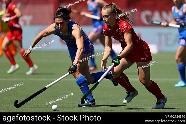 Netherlands' Malou Phenninckx and Belgium's Justine Rasir fight for the ball during a hockey match between the Belgian Red Panthers and The Netherlands in the...