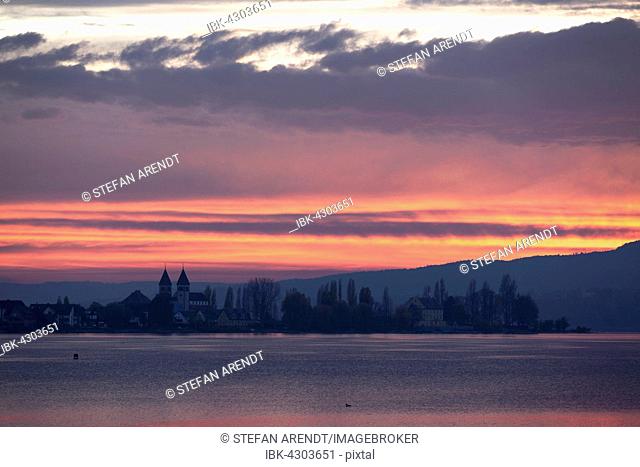 Evening mood with sunset and view on Reichenau island and the Church of Peter and Paul, Allensbach on Lake Constance, Baden-Württemberg, Germany