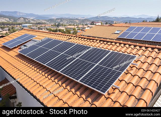 Solar panels on a roof. Drone view. Navarre, Spain, Europe. Environment and technology concepts