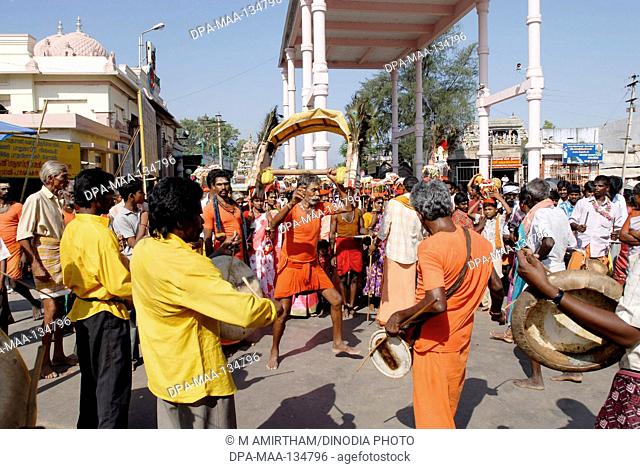 Theertha Kavadi ; Agni Nakshatram is a 14-day hottest period of the year ; at Kodumudi ardent devotees collect river Cauvery water in kavadis to Palani for...