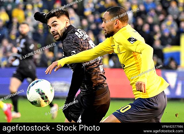 Mechelen's Sandy Walsh and Union's Loic Lapoussin pictured in action during a soccer match between Royale Union Saint-Gilloise and KV Mechelen