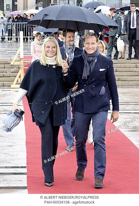Crown Prince Haakon and Crown Princess Mette Marit of Norway arrive at the Honnørbrygga dock in Oslo, on May 10, 2017, for a lunch at the Royal Yacht Norge on...