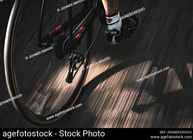 Low section of cyclist on bike