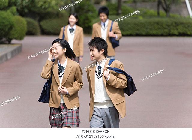 High School Students Walking Outside Together, Selective Focus