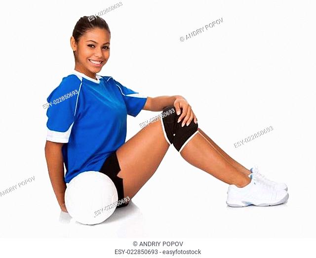 Happy Young Girl Sitting With Volleyball