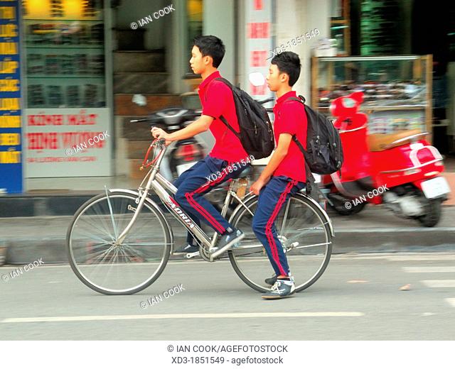 school boys on a bicycle, Hanoi, Vietnam