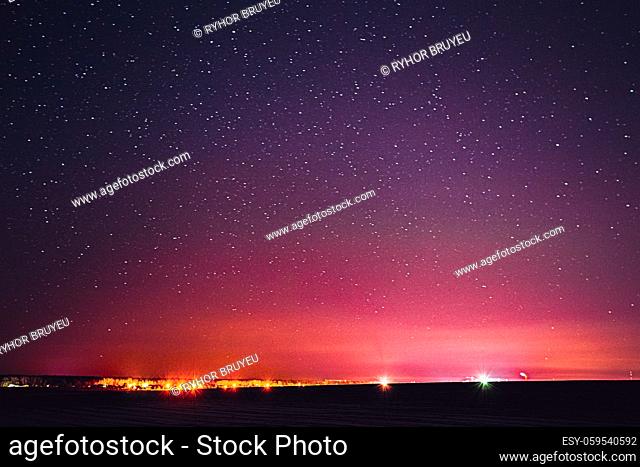 Night Sky Glowing Stars Background Backdrop. Colorful Sky Gradient. Sunset, Sunrise And Town Lights At Horizon. Colourful Night Starry Sky In Yellow Pink...