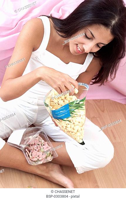 WOMAN SNACKING Model