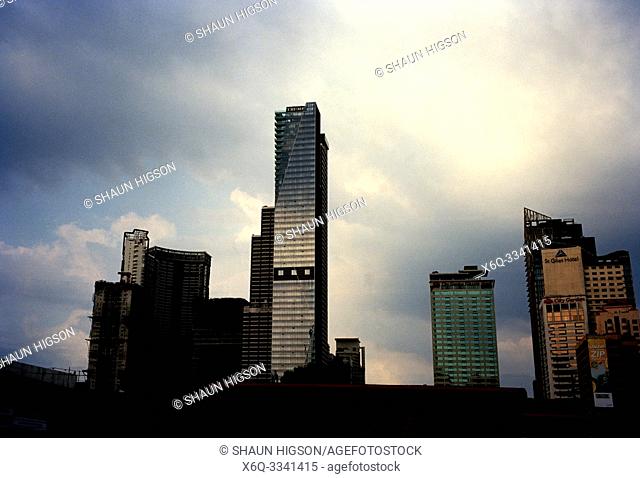 Manila skyline and Trump Tower in Makati in Manila in Luzon Metro Manila in the Philippines in Southeast Asia Far East