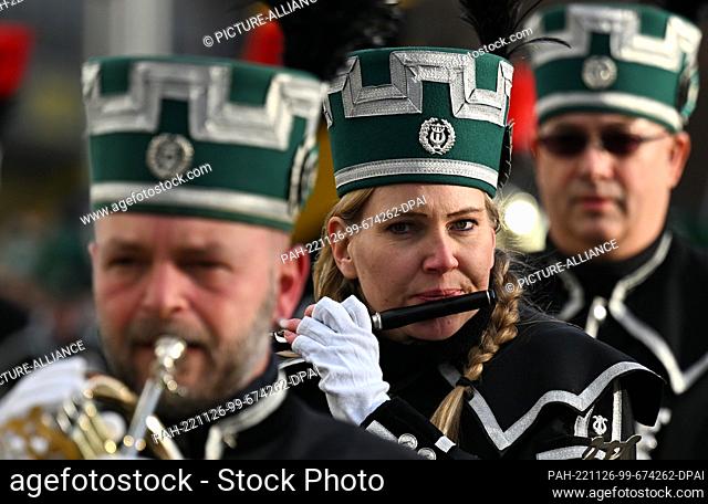 26 November 2022, Saxony, Chemnitz: Musicians of the Saxony State Mining Music Corps parade through downtown Chemnitz for the Great Mining Parade