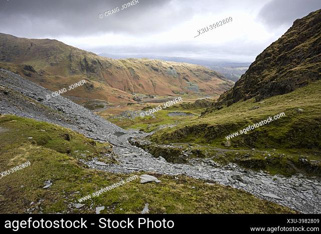 The path up the north east flank of The Old Man of Coniston through Saddlestone quarry with the Coppermine Valley below in the Lake District National Park