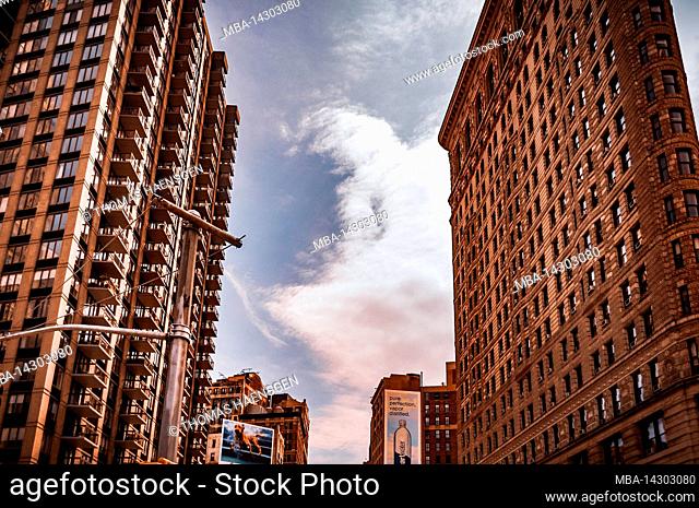 Midtown Manhattan, New York City, NY, USA, Flatiron Building at the side, focus on the cloud