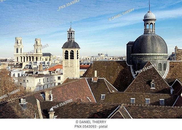 France. Paris 6th district. The bell tower and the dome of the church Saint Joseph des Carmes ( 1625 ). In the background: the church Saint Sulpice