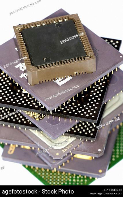 Close view detail of some computer microprocessors isolated on a white background
