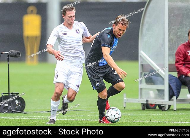 Beerschot's Yan Vorogovskiy and Club's Ruud Vormer fight for the ball during a friendly game between first league team Club Brugge and 1B team Beerschot