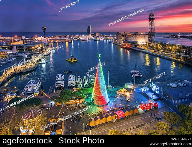 Sunset view of the Port of Barcelona and its Christmas Tree