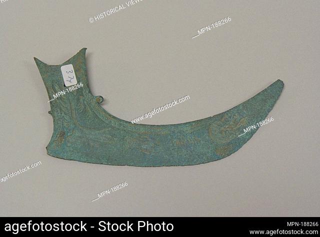 Boat-Shaped Hafted Ax. Period: Bronze and Iron Age period, Dongson culture; Date: 500 B.C.-A.D. 300; Culture: Vietnam (North); Medium: Bronze; Dimensions: H