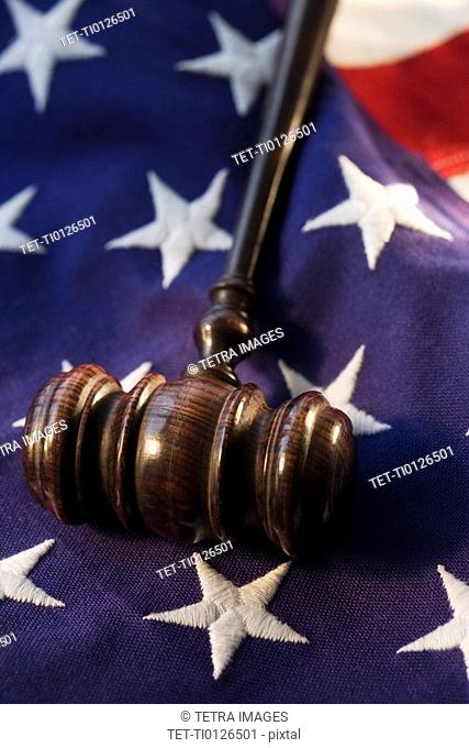 Judge’s gavel on American flag