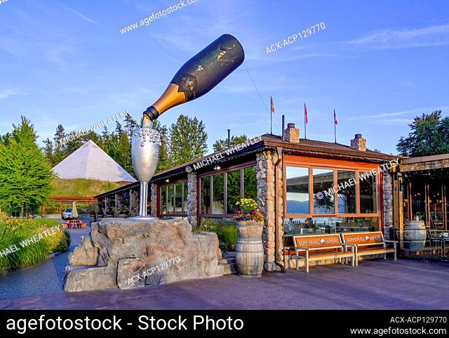 Pouring wine bottle sculpture, Summerhill Pyramid Winery, Kelowna, Okanagan Valley, British Columbia, Canada