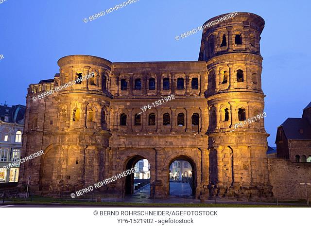 Porta nigra, ancient city gate, World Heritage Site, illuminated at night, Trier, Germany