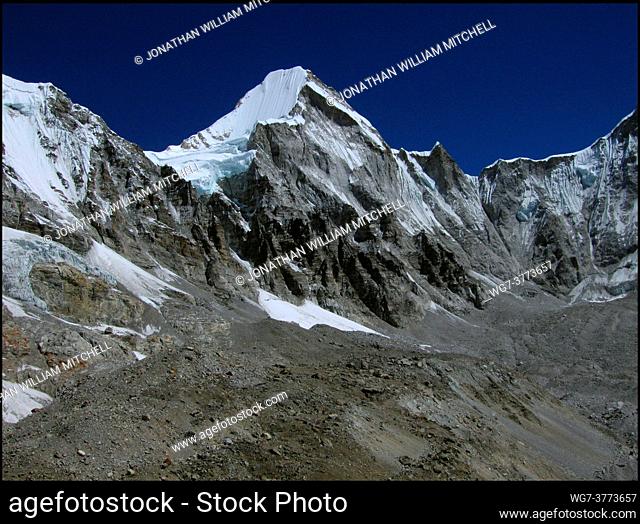 NEPAL Khumbu Glacier -- 16 Apr 2005 -- Tibetan glaciers (the ridge on this image is the border) on the slopes of Mount Lingtren (centre, 6697m)