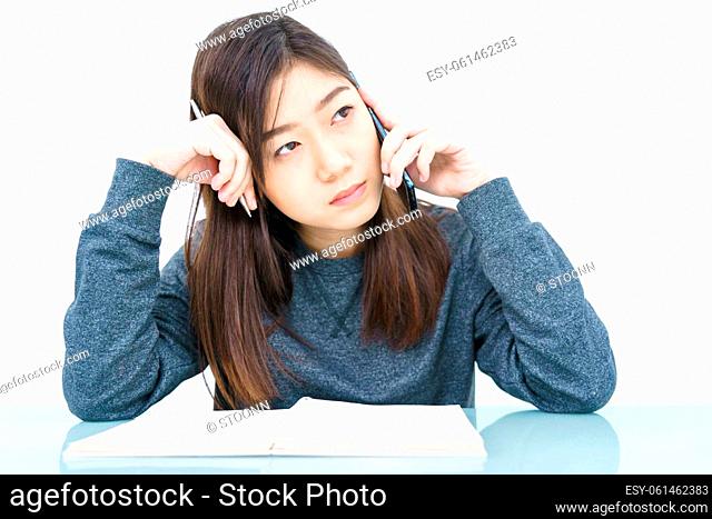 Woman long hair Woman using mobile phone and writing notebook on white background