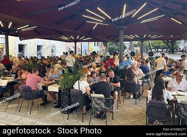 Porec port city in Istria / Croatia. Full restaurant despite the price explosion after the changeover to the euro and high inflation