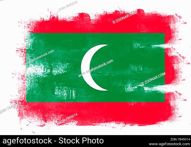 Flag of Maldives painted with brush on solid background