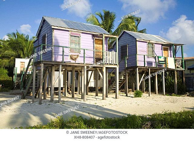 Wooden beach cabanas on stilts, Caye Caulker, Belize
