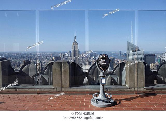 Viewing platform of the Rockefeller Center with Empire State Building in the background, New York City, USA