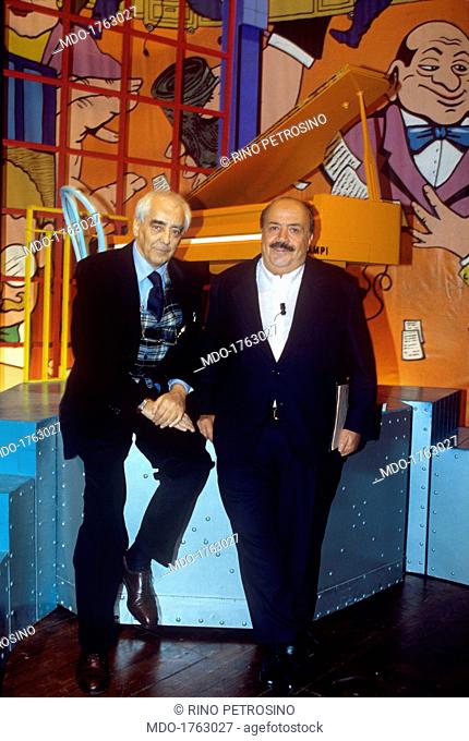 Alberto Silvestri and Maurizio Costanzo at the Maurizio Costanzo Show. Italian scenarist and TV author Alberto Silvestri posing in front of the set of Maurizio...