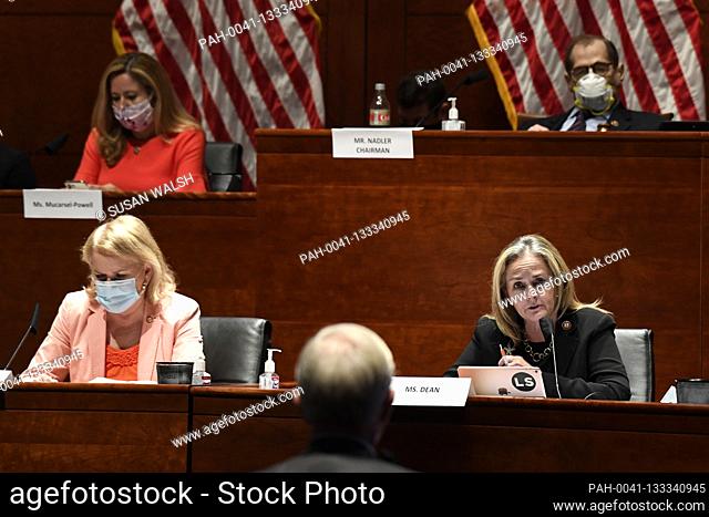 United States Representative Madeleine Dean (Democrat of Pennsylvania), lower right, questions former Deputy Attorney General Donald Ayer, front