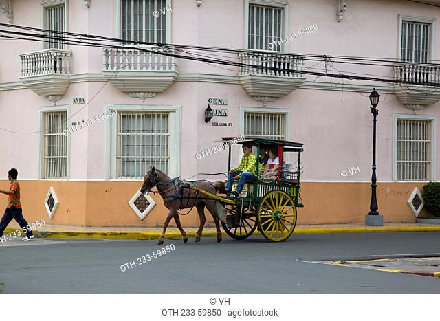 Tourists touring on carriage at Intramuros, Manila, Philippines