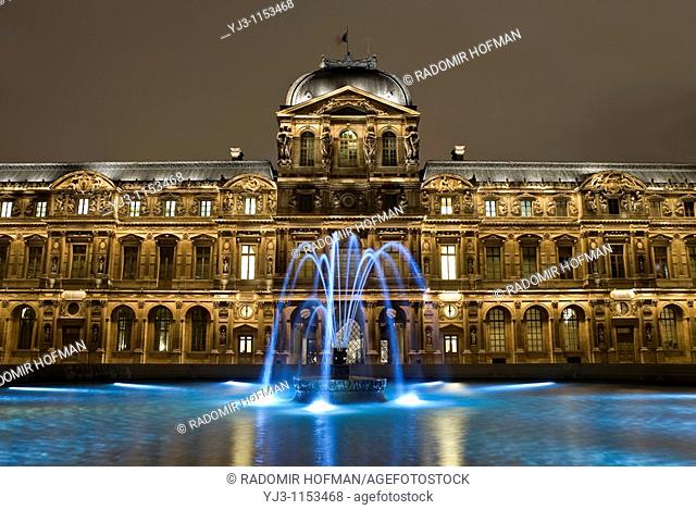 The Luvre Museum at night, Paris, France