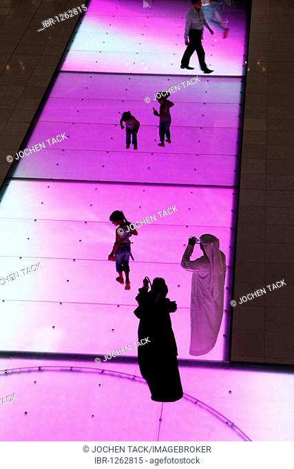 Light show, inserted into ground, in the Dubai Mall, Dubai, United Arab Emirates, Middle East